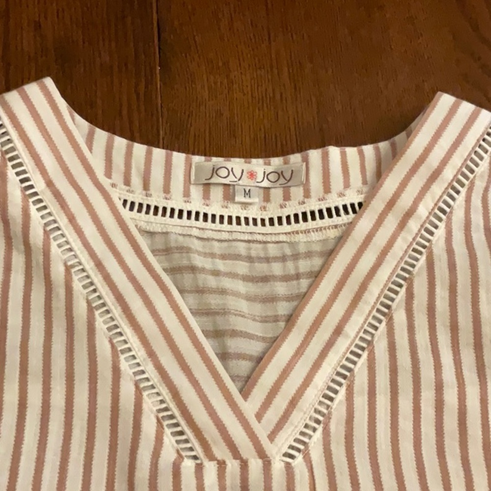 Wonderful, wear so many ways, blouse. Great style & look.Soft, light, fab design